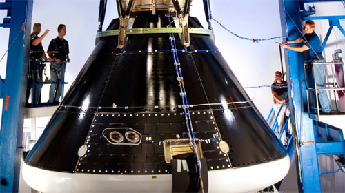 Acoustic engineers at work on the NASA Orion Multi-Purpose Crew Vehicle