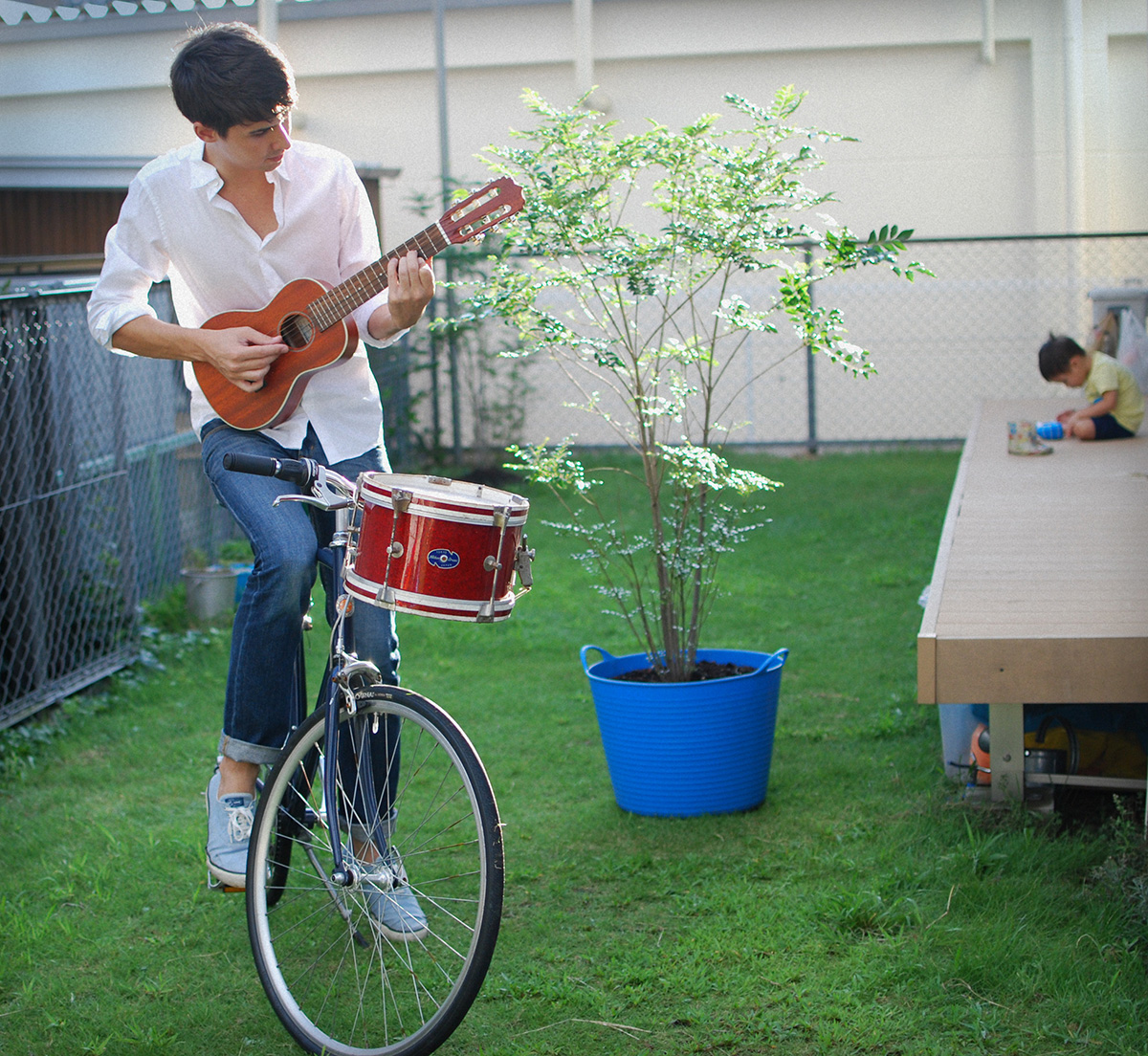 Lullatone: Shawn on the Bike with Drum and Guitalele